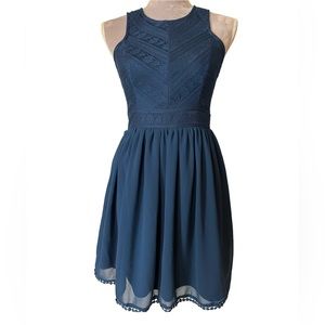Francesca’s collections fit and flare mini dress with lace detail. size small